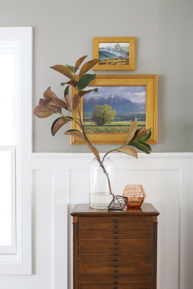 Example of a mid-sized transitional enclosed dark wood floor living room design in Salt Lake City with gray walls