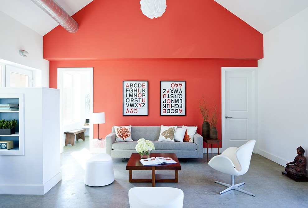Example of a country concrete floor living room design in Providence