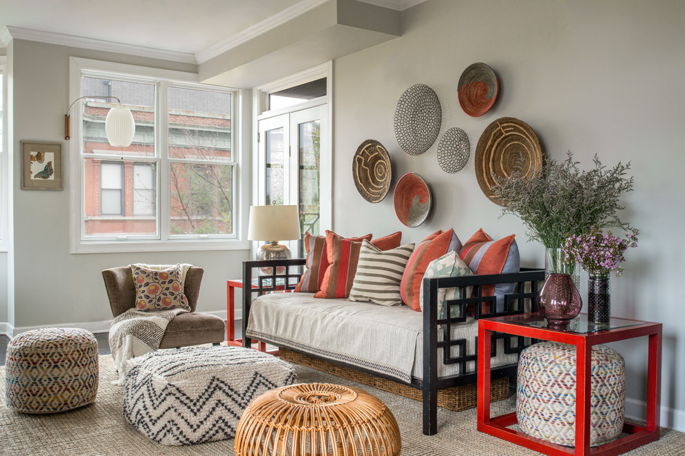 Traditional living room in Chicago with grey walls, dark hardwood flooring and brown floors.