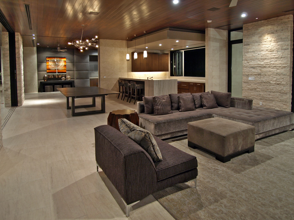 Living room - large contemporary open concept porcelain tile and beige floor living room idea in Las Vegas with beige walls and no fireplace
