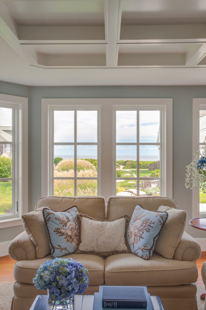 Inspiration for a mid-sized coastal formal and enclosed medium tone wood floor and brown floor living room remodel in Boston with green walls, a standard fireplace, a stone fireplace and no tv