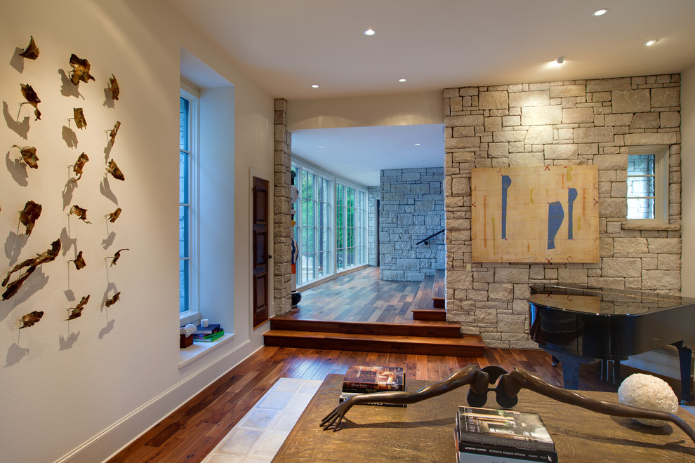 Example of an eclectic living room design in Austin with a music area