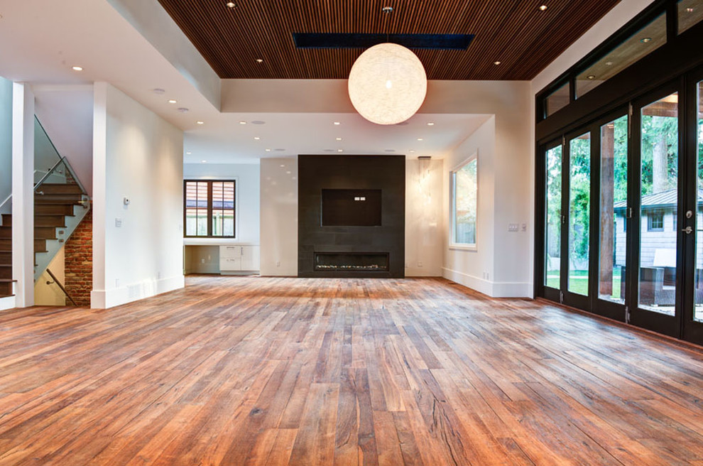 Contemporary living room in Vancouver with medium hardwood flooring.