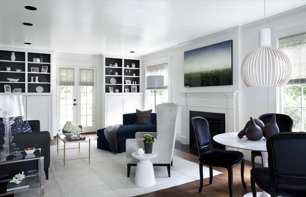 Inspiration for a timeless living room remodel in Austin with white walls