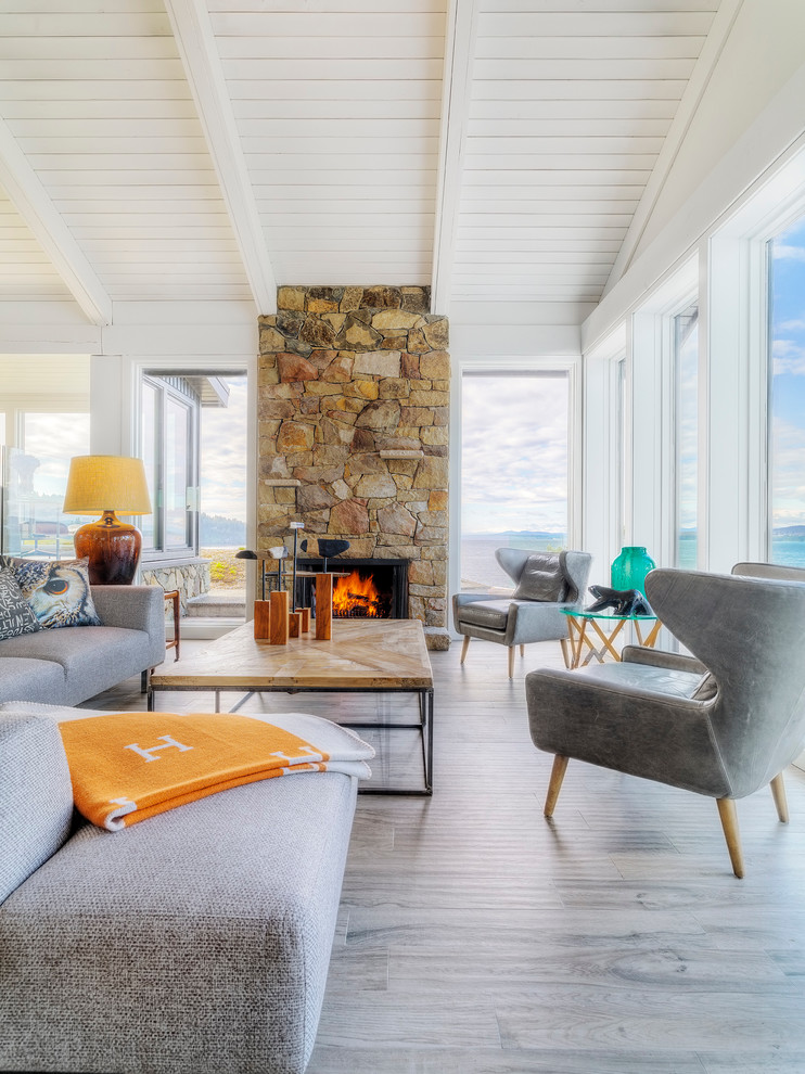 Living room - coastal light wood floor living room idea in Vancouver with white walls