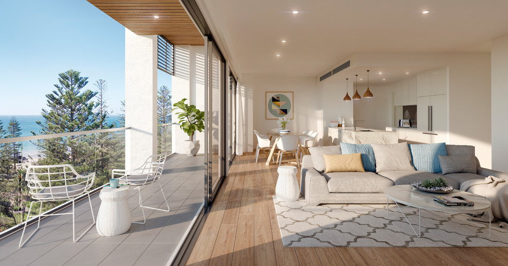 Großes, Offenes Nordisches Wohnzimmer mit weißer Wandfarbe, hellem Holzboden und buntem Boden in Sydney