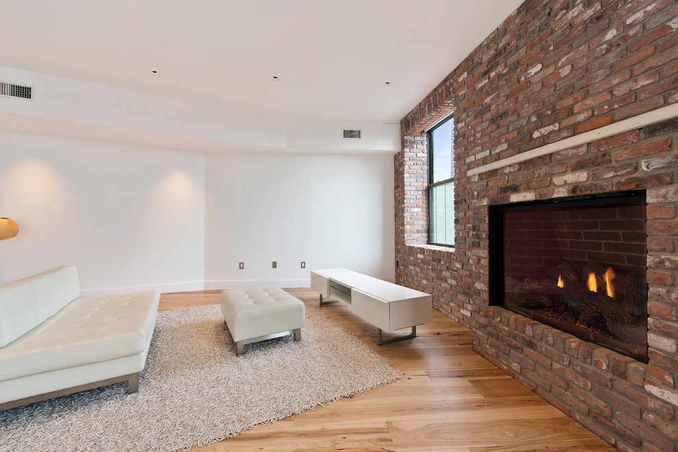 Living room - industrial living room idea in New York