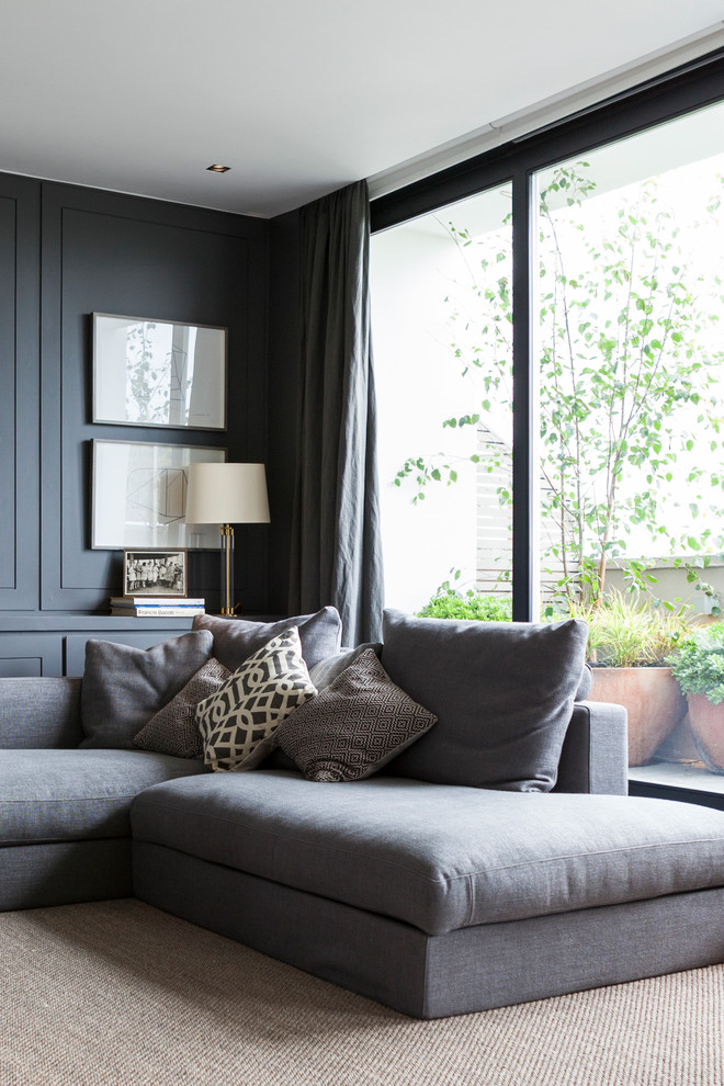 Contemporary grey and black living room in London.