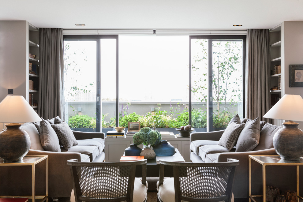 Источник вдохновения для домашнего уюта: открытая гостиная комната среднего размера в современном стиле с серыми стенами