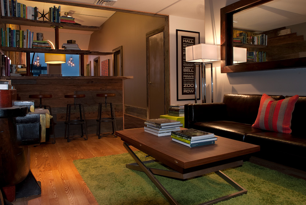 Contemporary living room in Philadelphia with white walls and medium hardwood flooring.