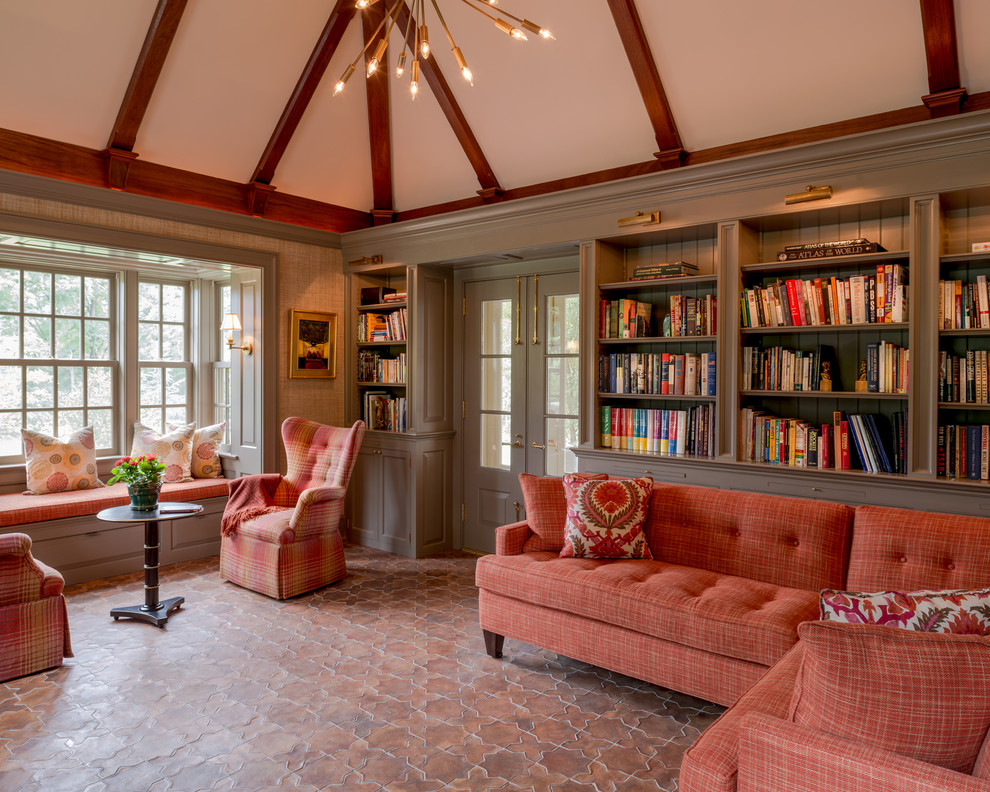 Foto di un grande soggiorno classico chiuso con libreria e pareti beige