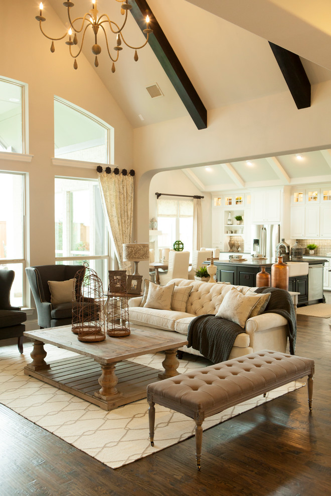 Example of a classic formal and open concept dark wood floor living room design in Dallas with beige walls