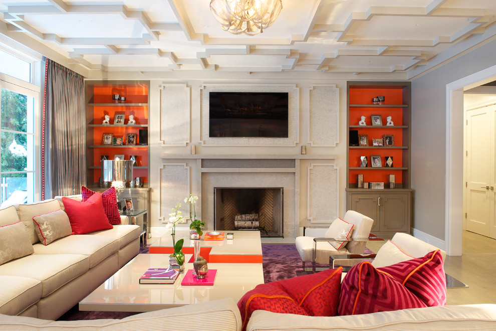 Источник вдохновения для домашнего уюта: большая изолированная гостиная комната в стиле неоклассика (современная классика) с серыми стенами, стандартным камином, фасадом камина из плитки и телевизором на стене