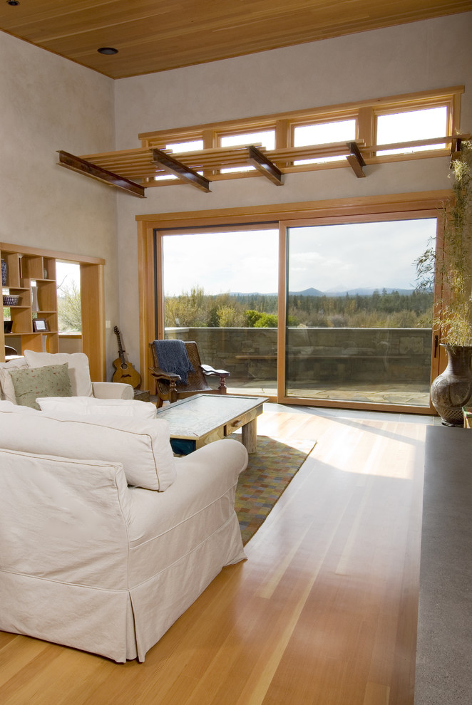 Immagine di un soggiorno minimal con pareti beige