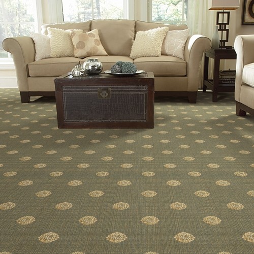 Inspiration for a large traditional open plan living room in Detroit with carpet, beige walls and green floors.