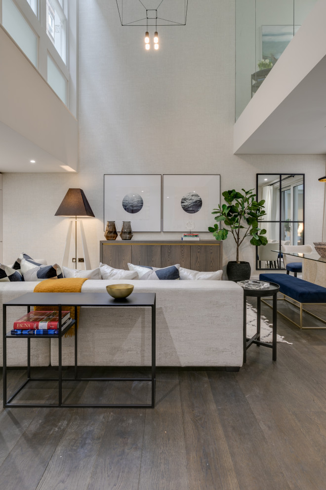 Medium sized modern open plan living room in London.