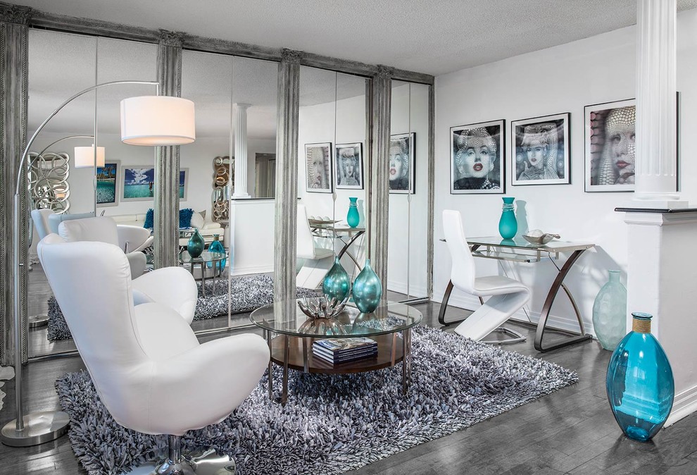 Trendy living room photo in Miami with white walls