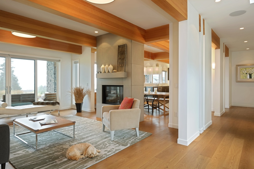 Design ideas for a rural entrance in Seattle with white walls and medium hardwood flooring.