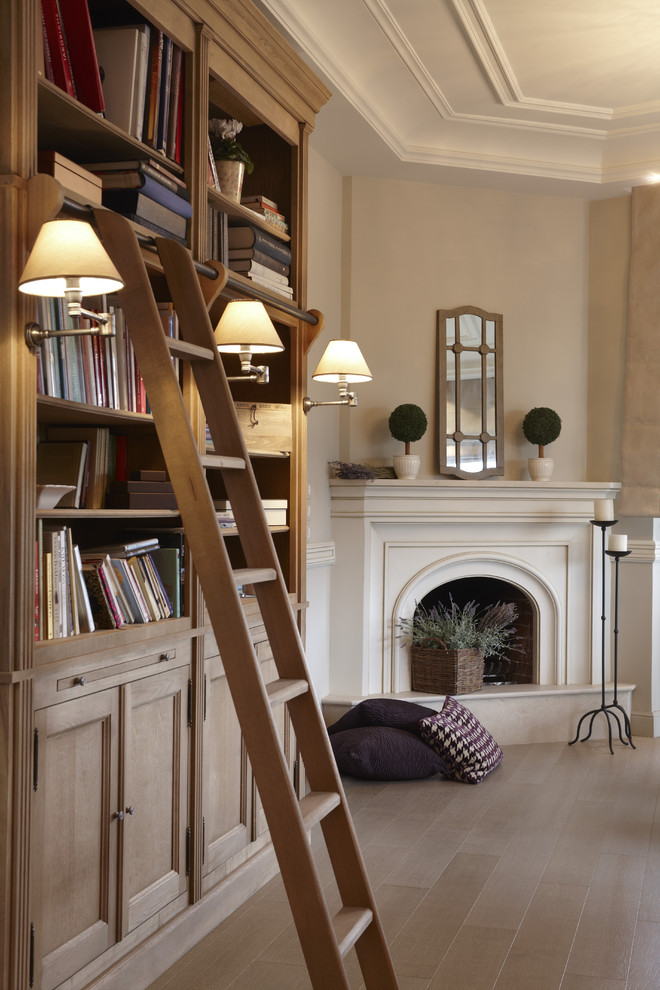 Example of a trendy living room design with a corner fireplace and a plaster fireplace