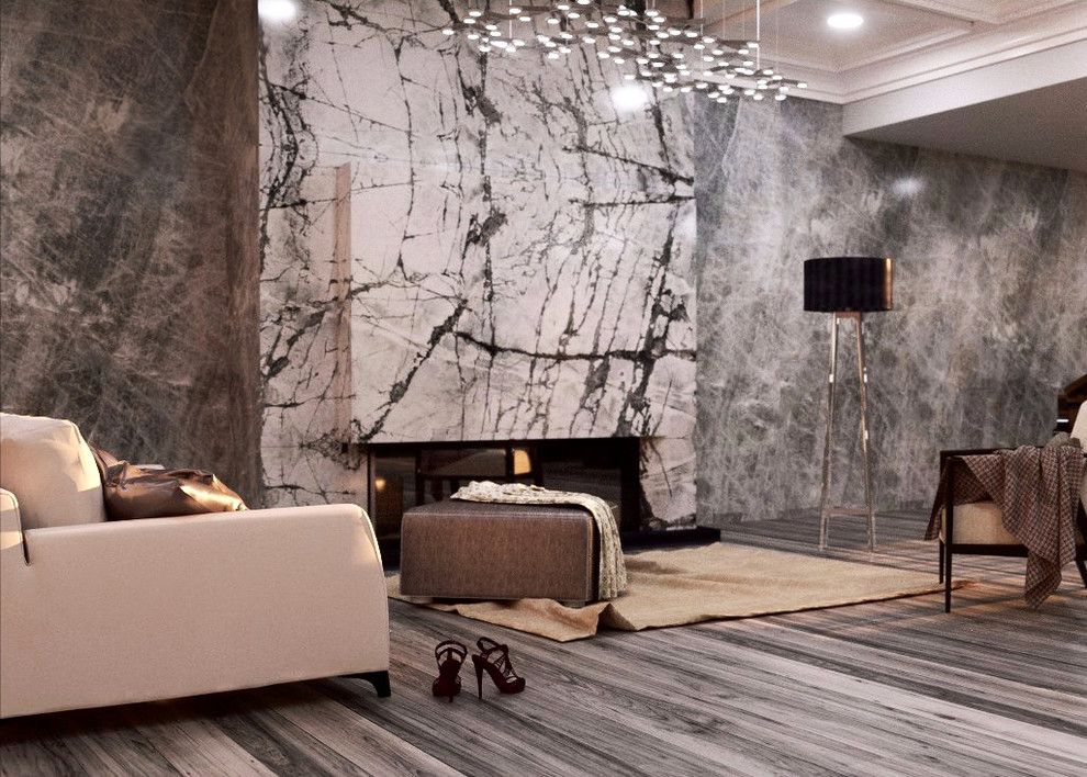 На фото: гостиная комната в современном стиле с фасадом камина из камня
