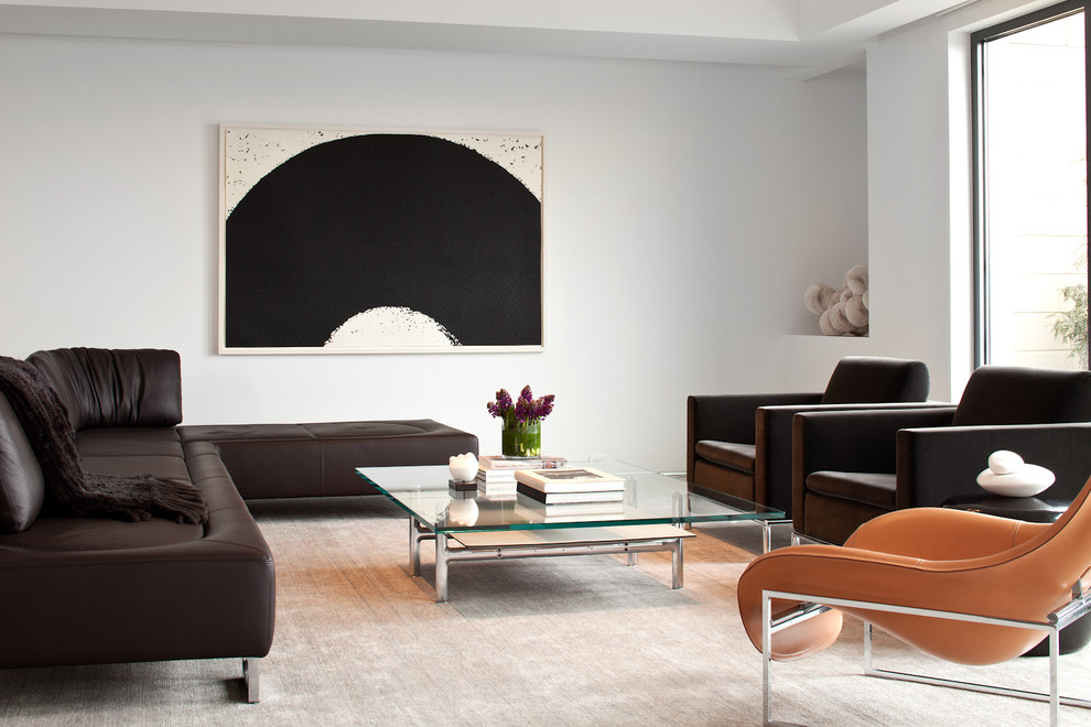 Photo of a large modern open plan living room in Boston with white walls.