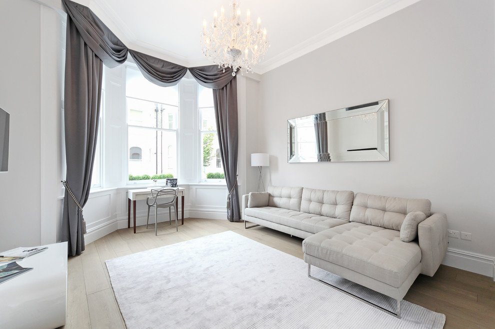 Transitional living room photo in London
