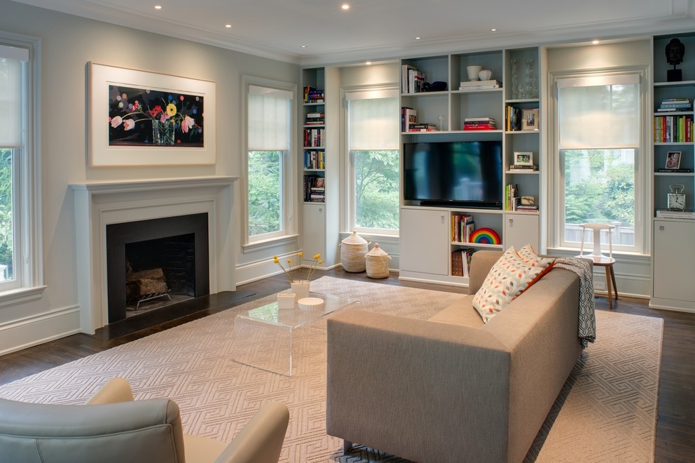 Transitional dark wood floor living room photo in DC Metro with white walls, a standard fireplace, a plaster fireplace and a media wall