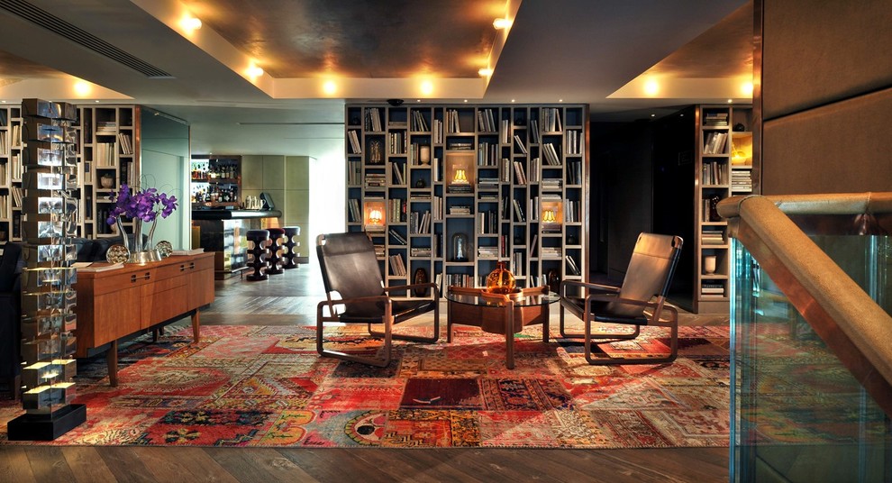 Inspiration for a dark wood floor living room remodel in Other with brown walls