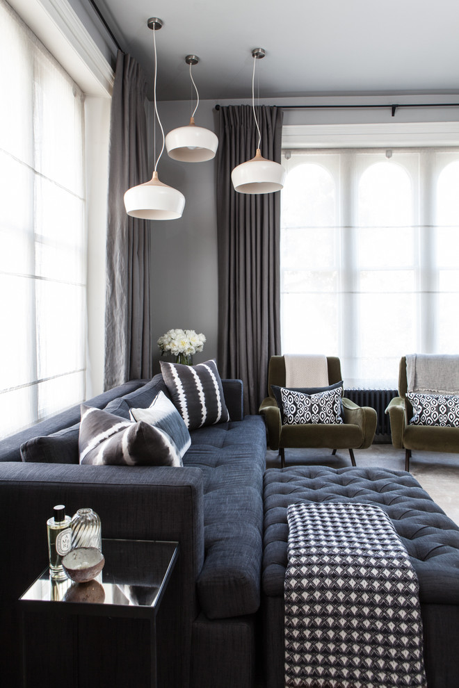 Example of a trendy living room design in Sussex