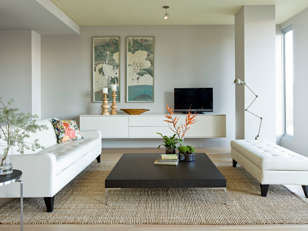 Living room - modern living room idea in Portland with gray walls and a tv stand
