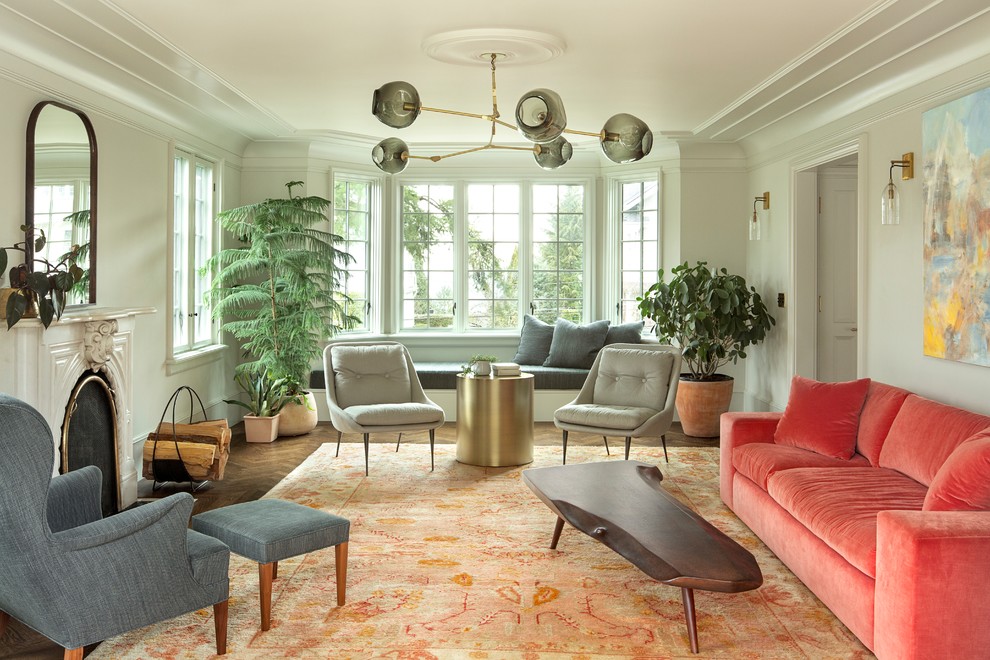 Example of a mid-sized transitional formal and enclosed dark wood floor and brown floor living room design in Portland with a standard fireplace, white walls, a wood fireplace surround and no tv
