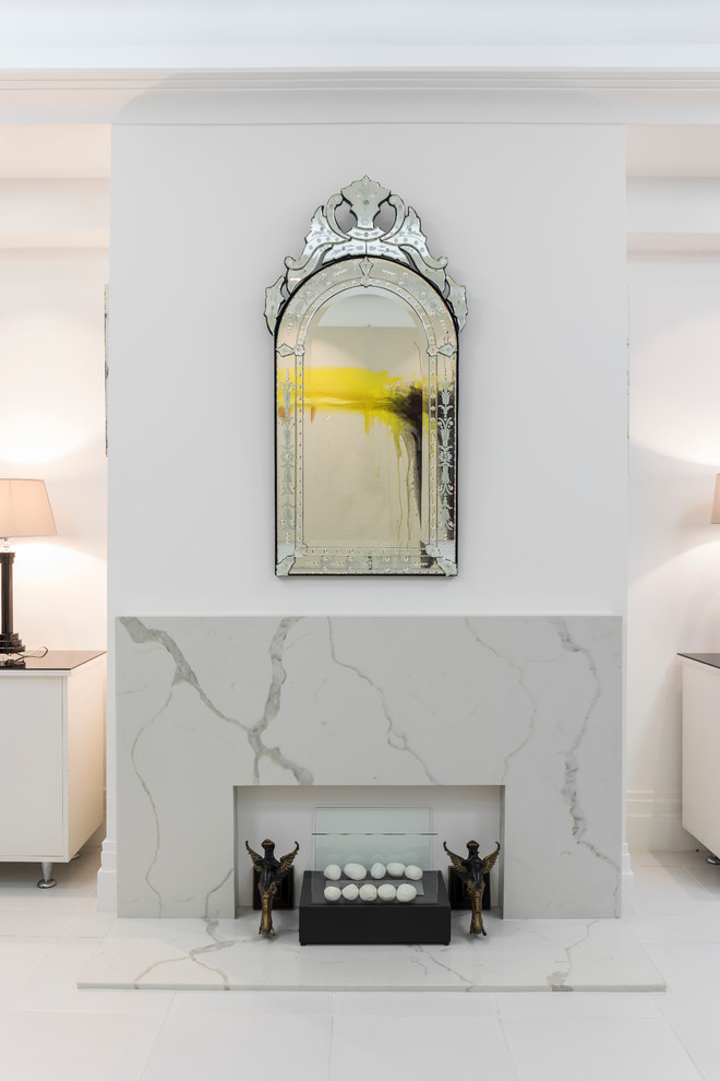 Photo of a medium sized contemporary formal open plan living room in London with white walls, ceramic flooring, a standard fireplace, a stone fireplace surround and no tv.