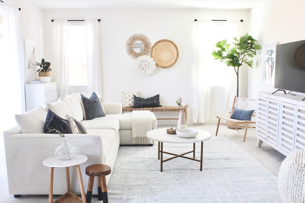 Inspiration for a coastal carpeted and gray floor living room remodel in Sacramento with white walls and a tv stand