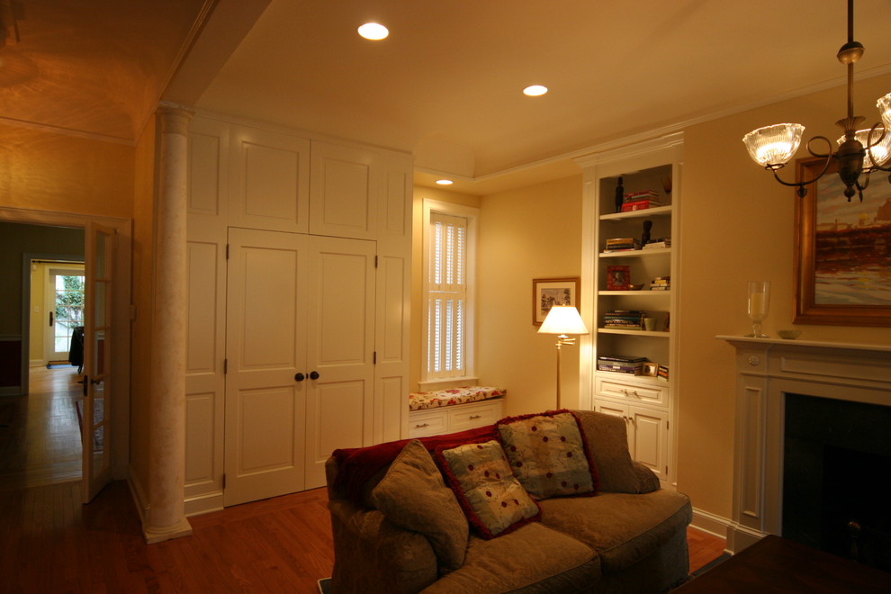 powder room addition with architectural panels and bookcases - Traditional - Living Room ...