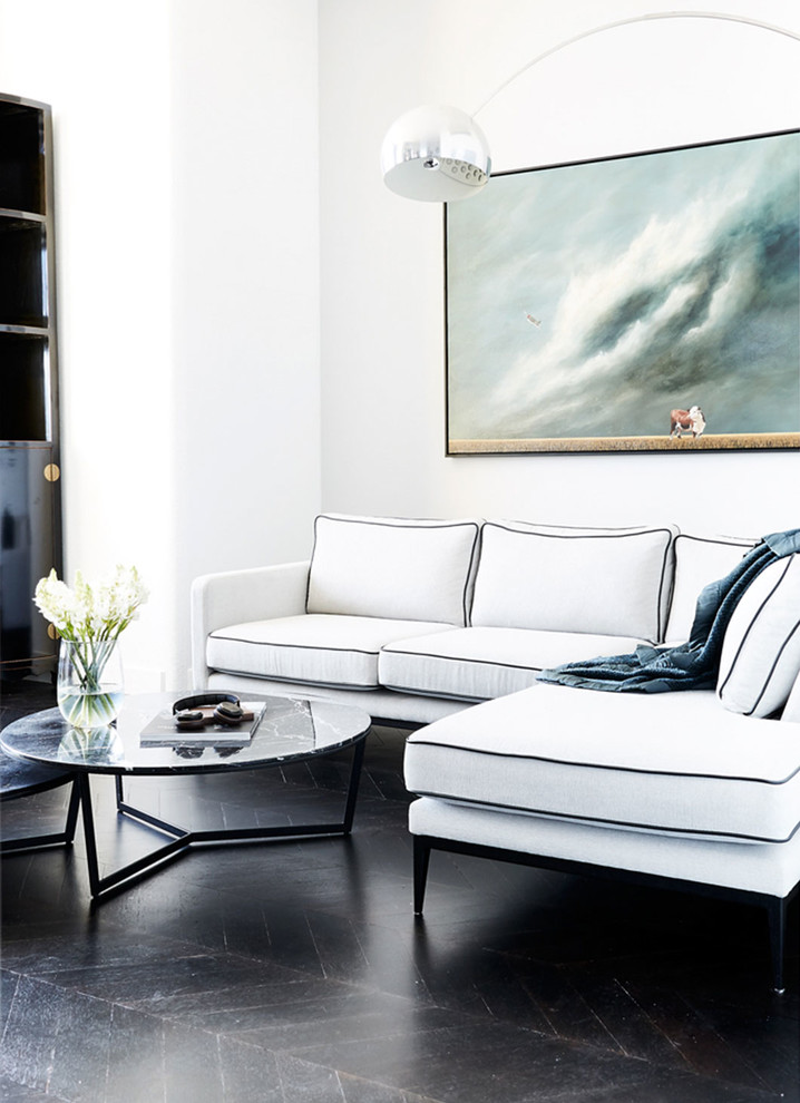 Example of a transitional living room design in Melbourne