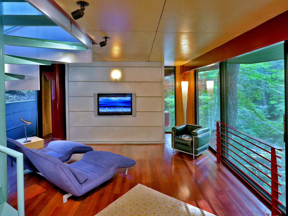 Idee per un soggiorno minimalista con TV a parete