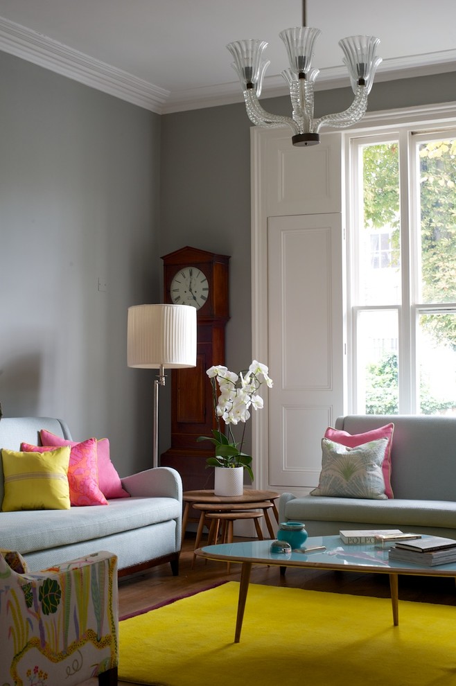 This is an example of a classic living room in London with grey walls.