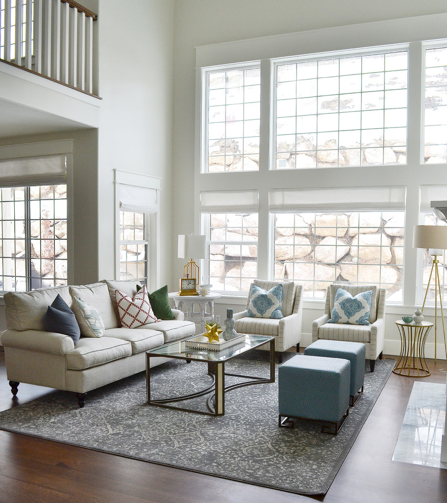 Example of a transitional living room design in Salt Lake City with gray walls