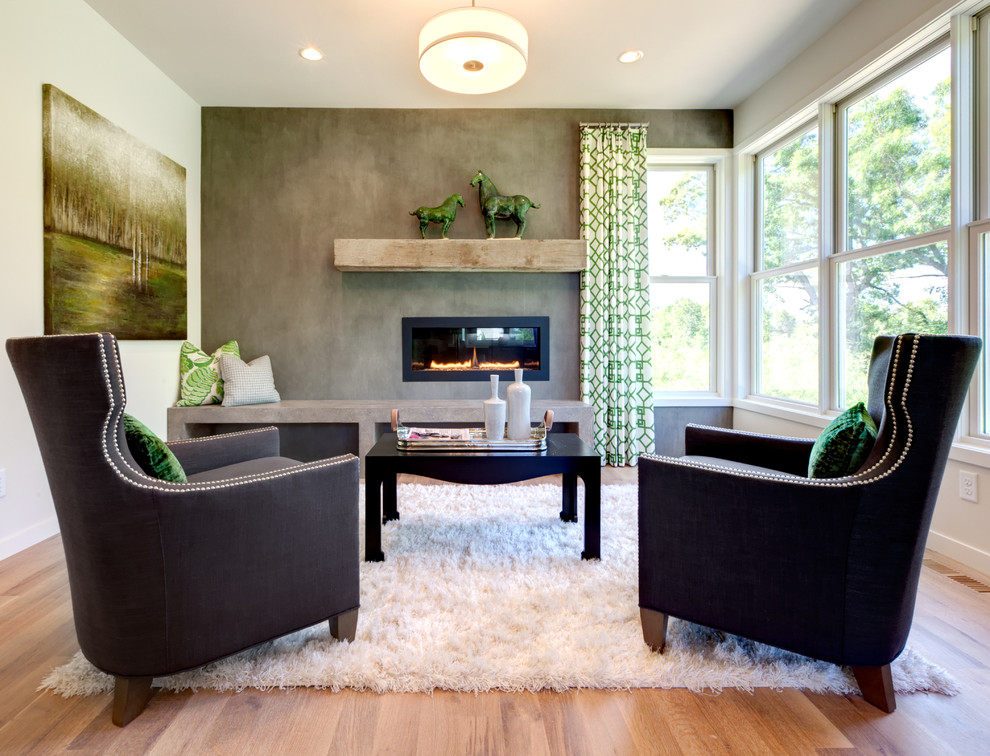 Inspiration pour un salon design ouvert avec un mur gris, un sol en bois brun, une cheminée ribbon et aucun téléviseur.
