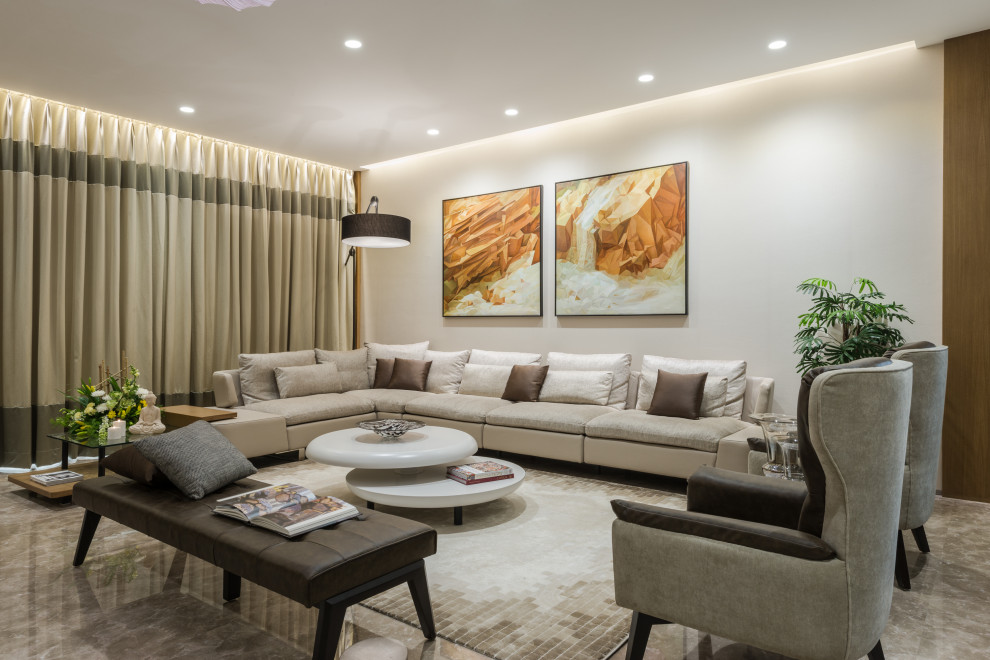 Imagen de sala de estar contemporánea con paredes blancas y suelo gris