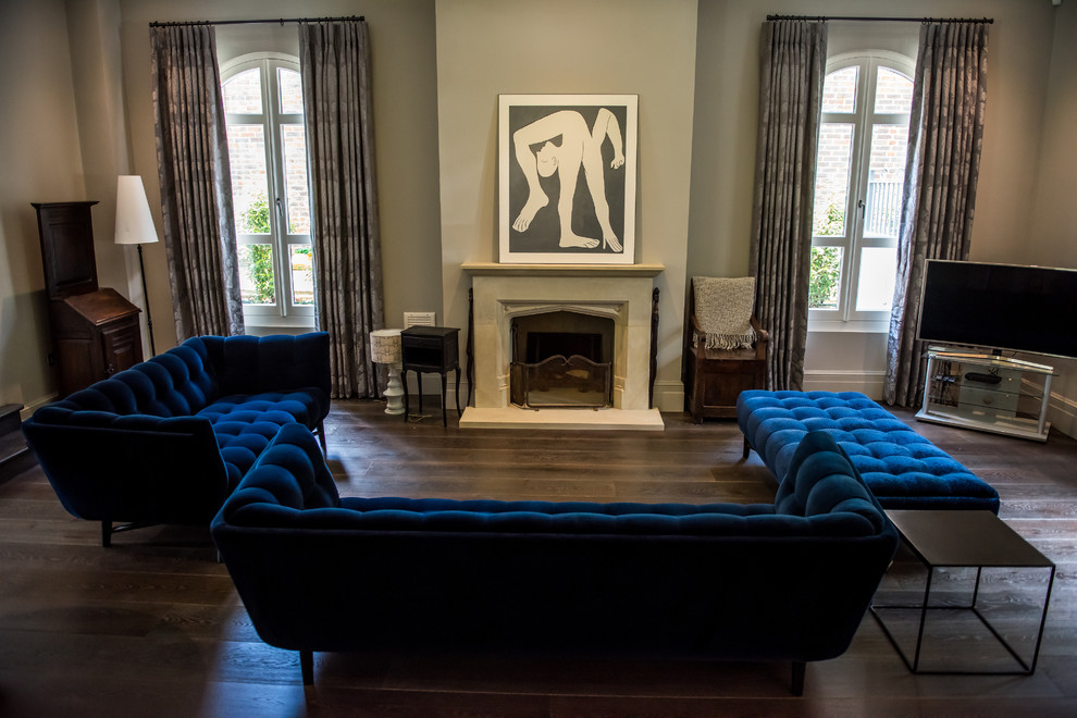 Living room - contemporary dark wood floor living room idea in London