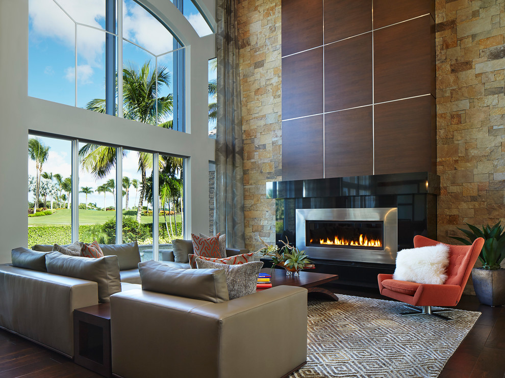 This is an example of a contemporary formal living room in Miami with dark hardwood flooring, a ribbon fireplace and no tv.