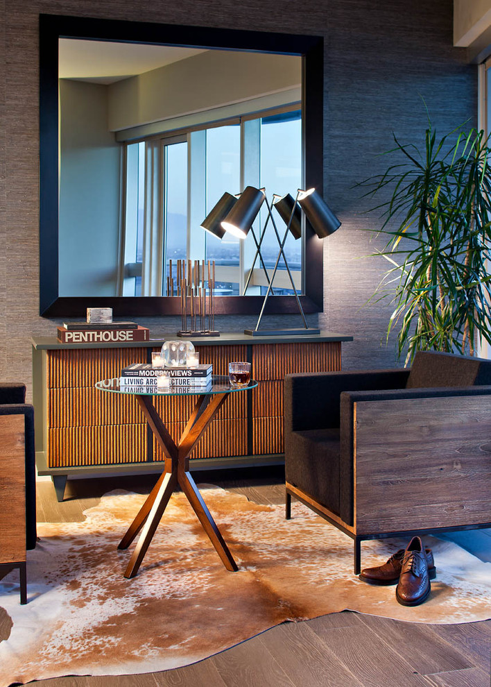Example of a minimalist living room design in Las Vegas with gray walls