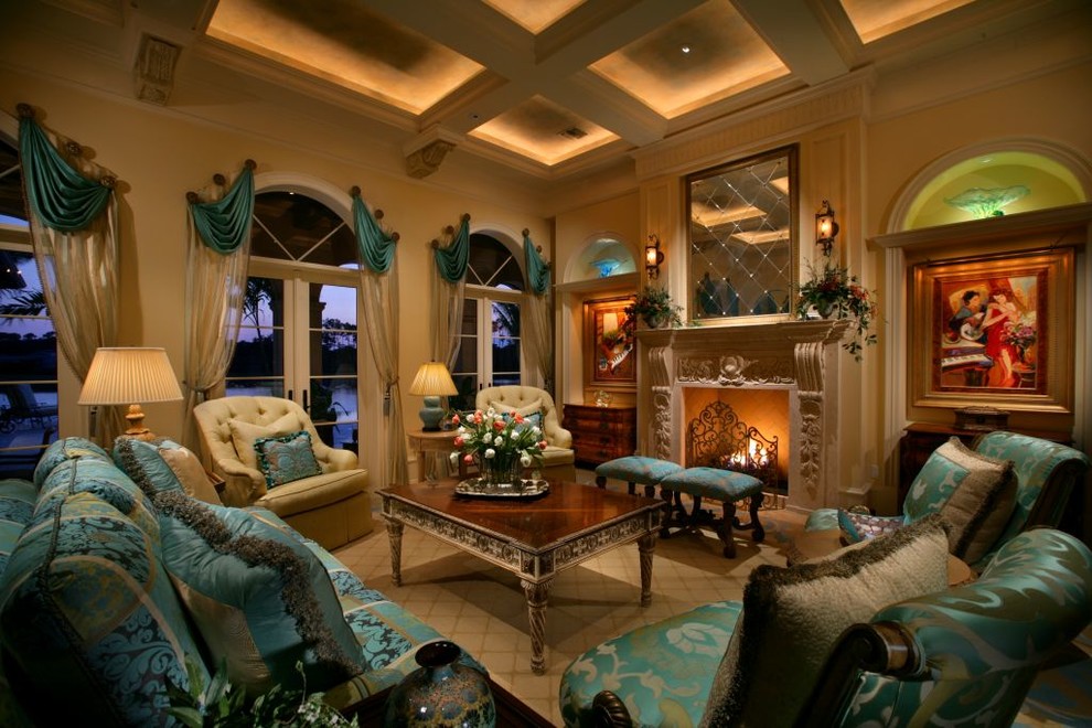 Mediterranean living room in Miami with yellow walls, a standard fireplace and a stone fireplace surround.