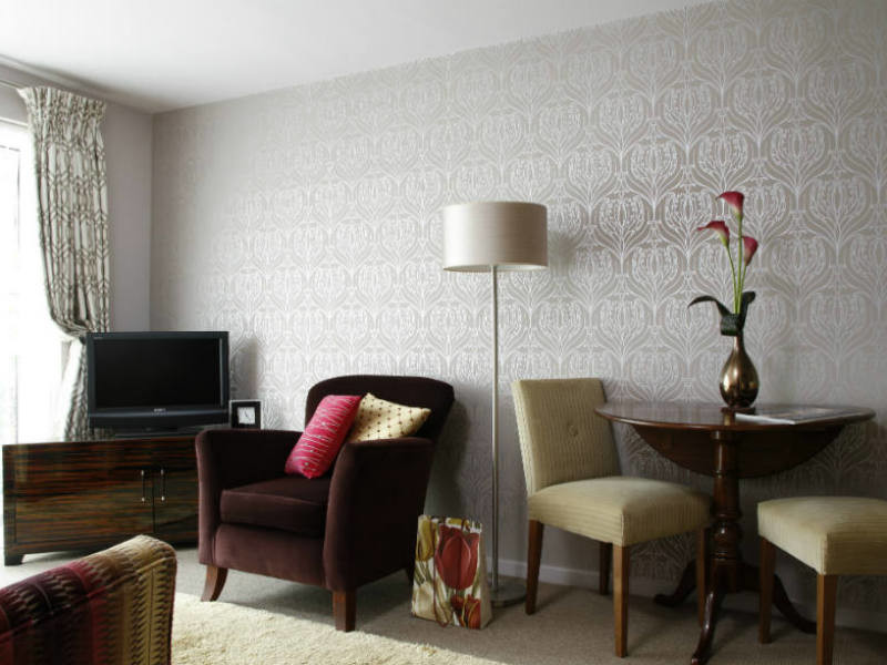 Living room - small traditional formal and open concept carpeted living room idea in London with gray walls