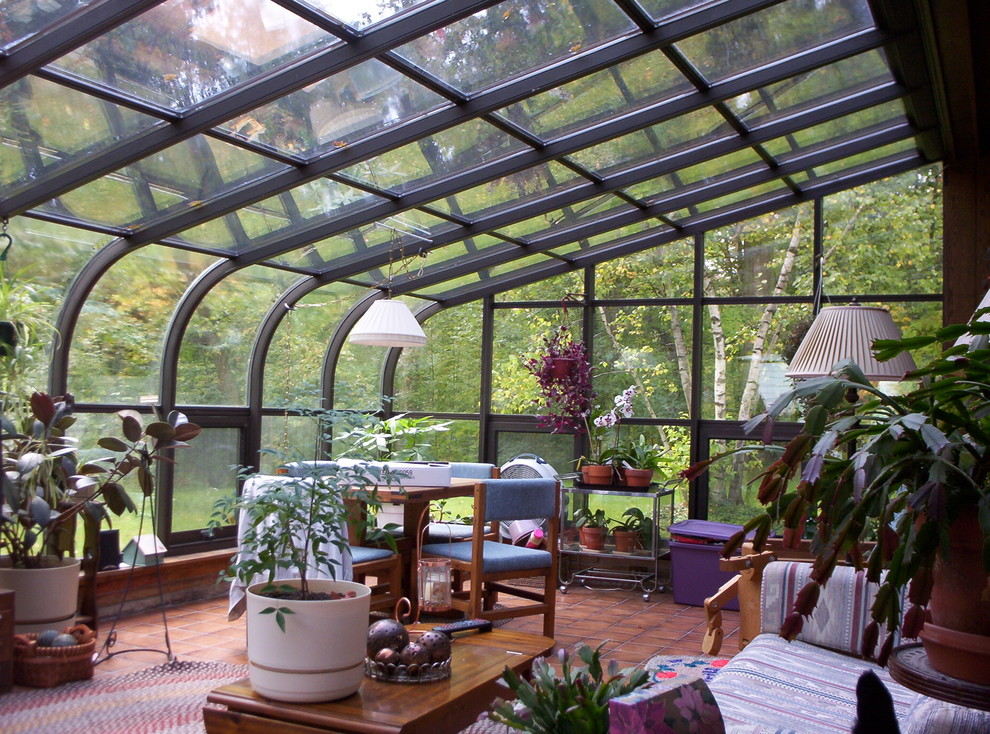 Example of an arts and crafts sunroom design in New York