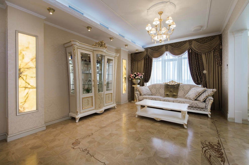 Idee per un grande soggiorno classico aperto con sala formale, pareti bianche, parquet chiaro, nessun camino, parete attrezzata e pavimento beige