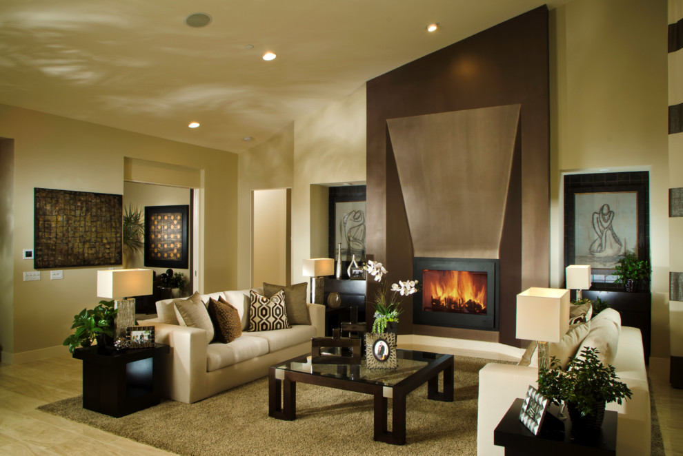 Imagen de salón para visitas actual con paredes beige y todas las chimeneas