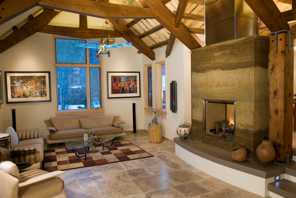 Large mountain style formal and enclosed ceramic tile and brown floor living room photo in Other with white walls, a standard fireplace, a stone fireplace and no tv