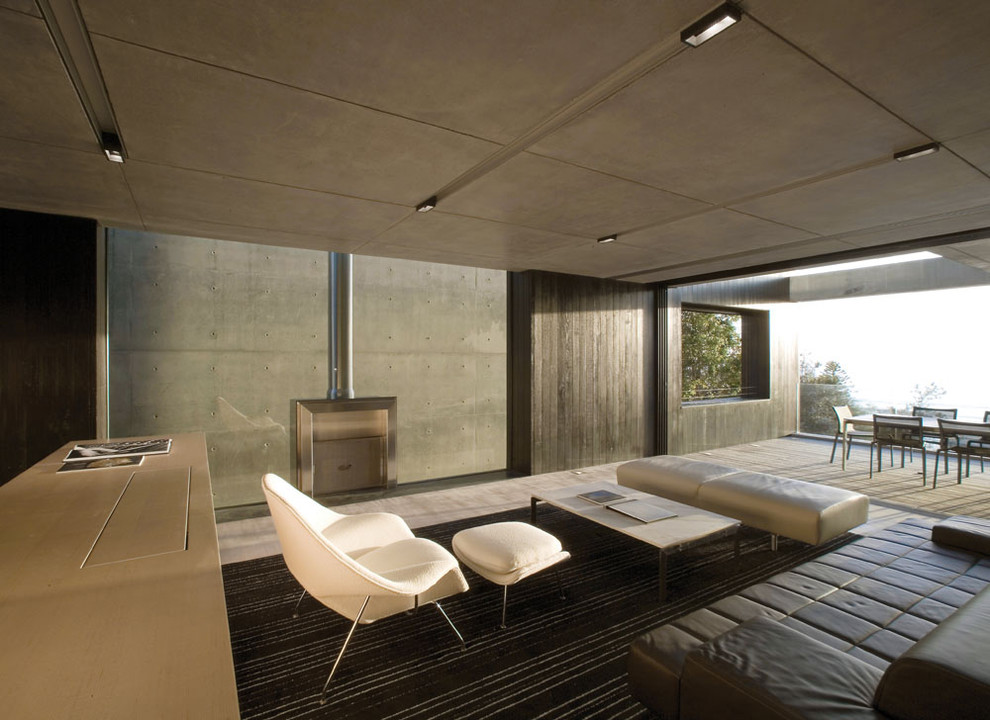 Стильный дизайн: открытая гостиная комната в стиле модернизм без телевизора - последний тренд